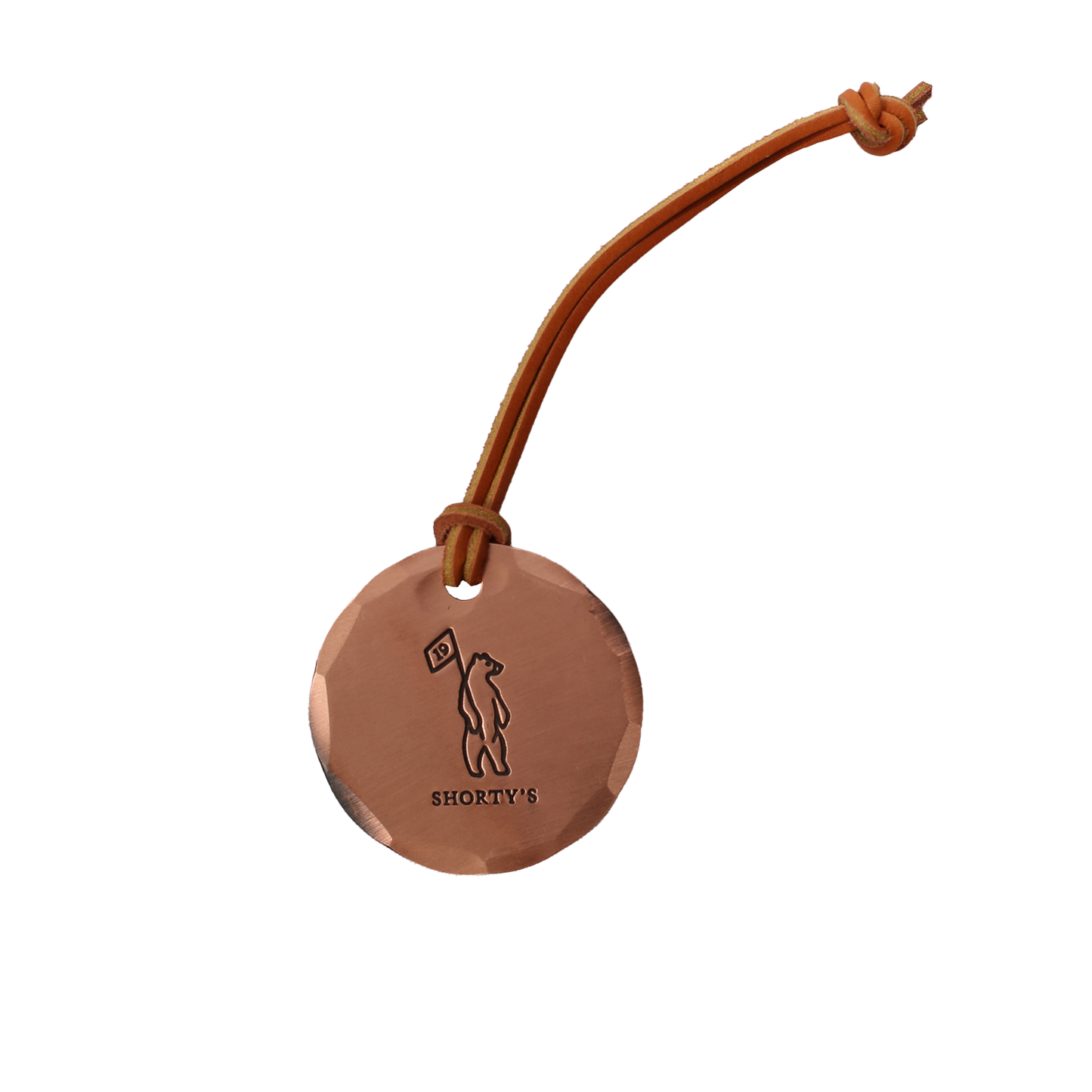 Copper bag tag with the Shorty's bear logo on the front. Leather Strap.