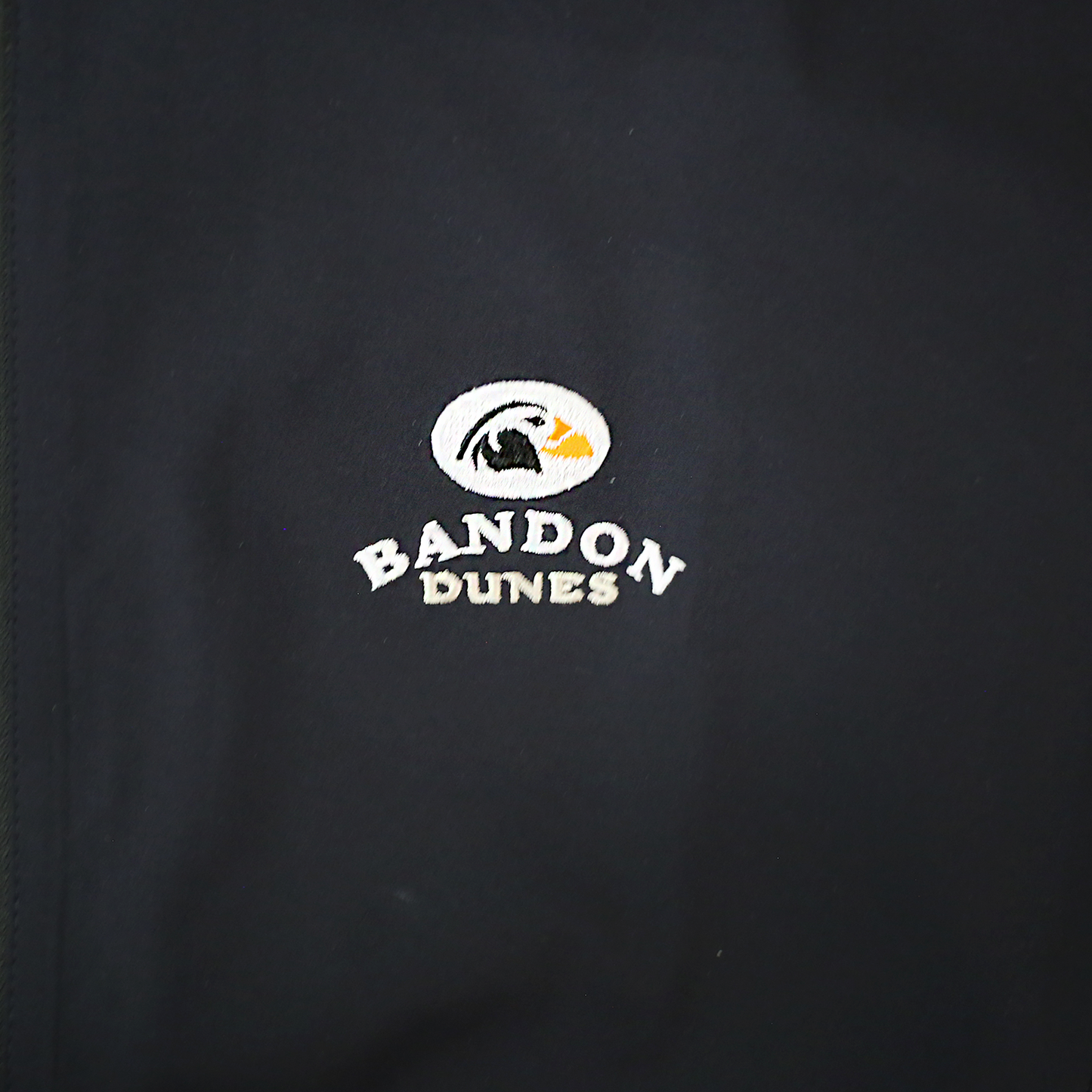 Close up of fabric and the Bandon Dunes logo.