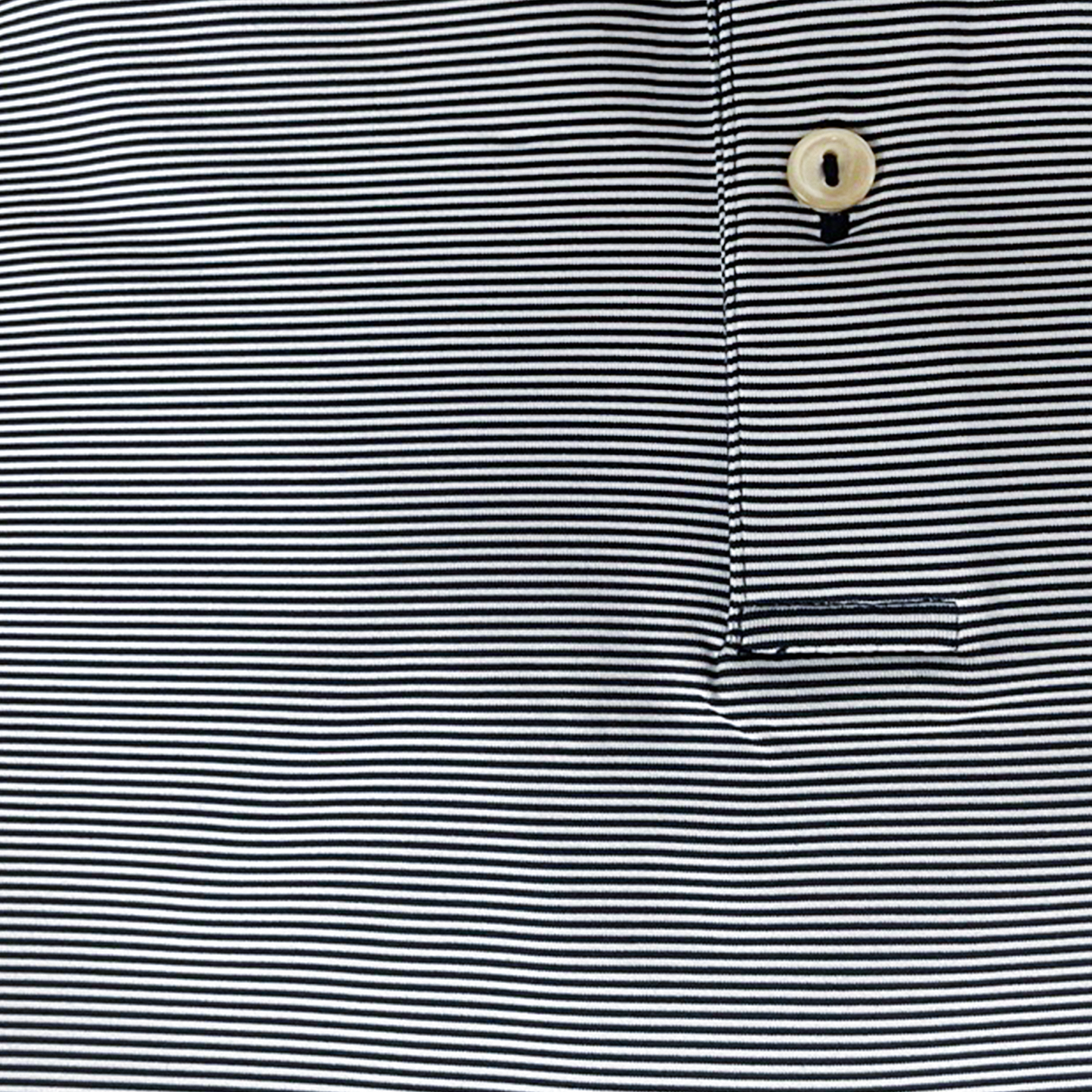 Close up of the navy and white stripe. Also shows the button.