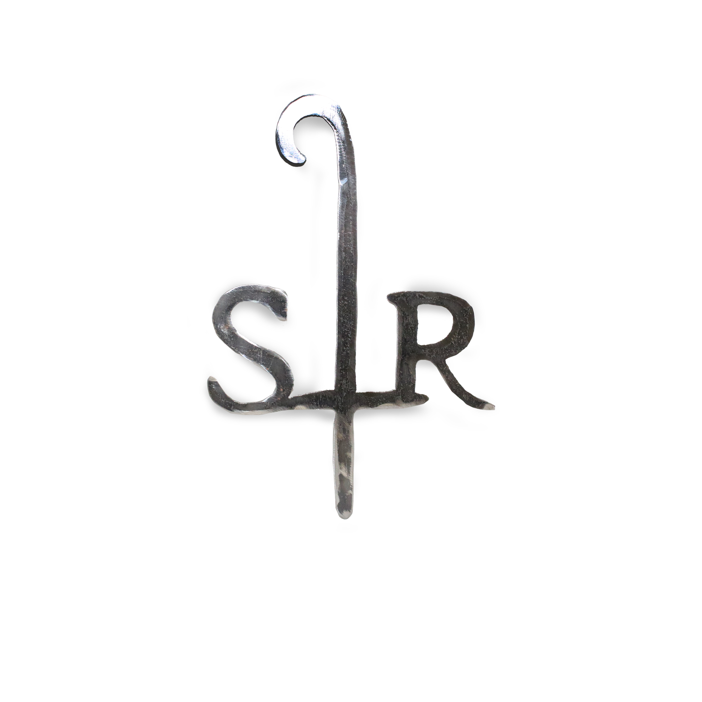 Cut forged iron shaped as the Sheep Ranch logo.