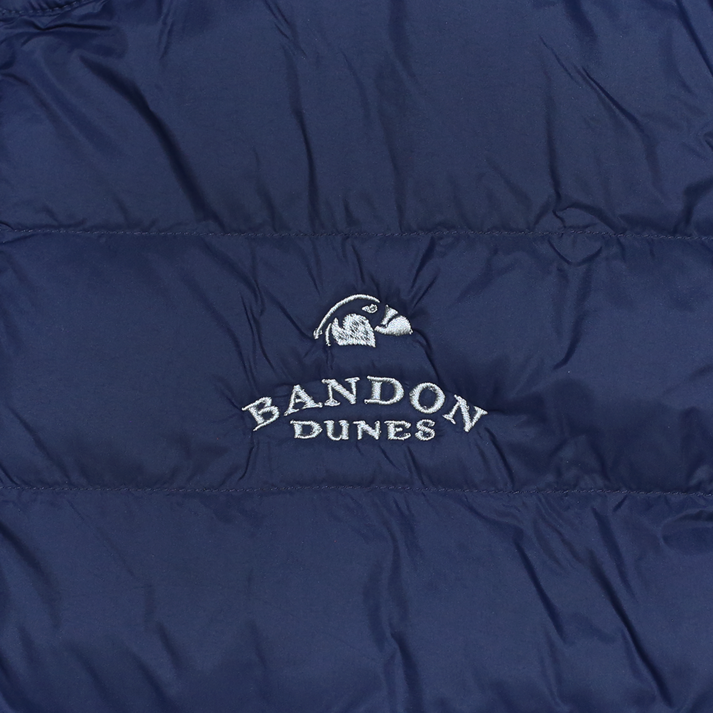 White embroidery Bandon Dunes logo on the left chest.