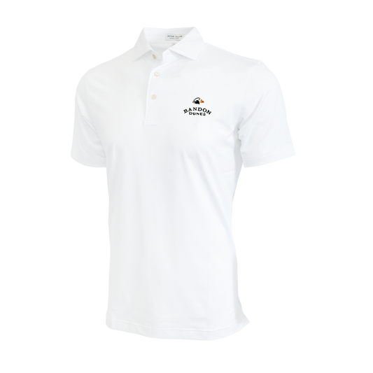 White polo shirt with the Bandon Dunes logo. 