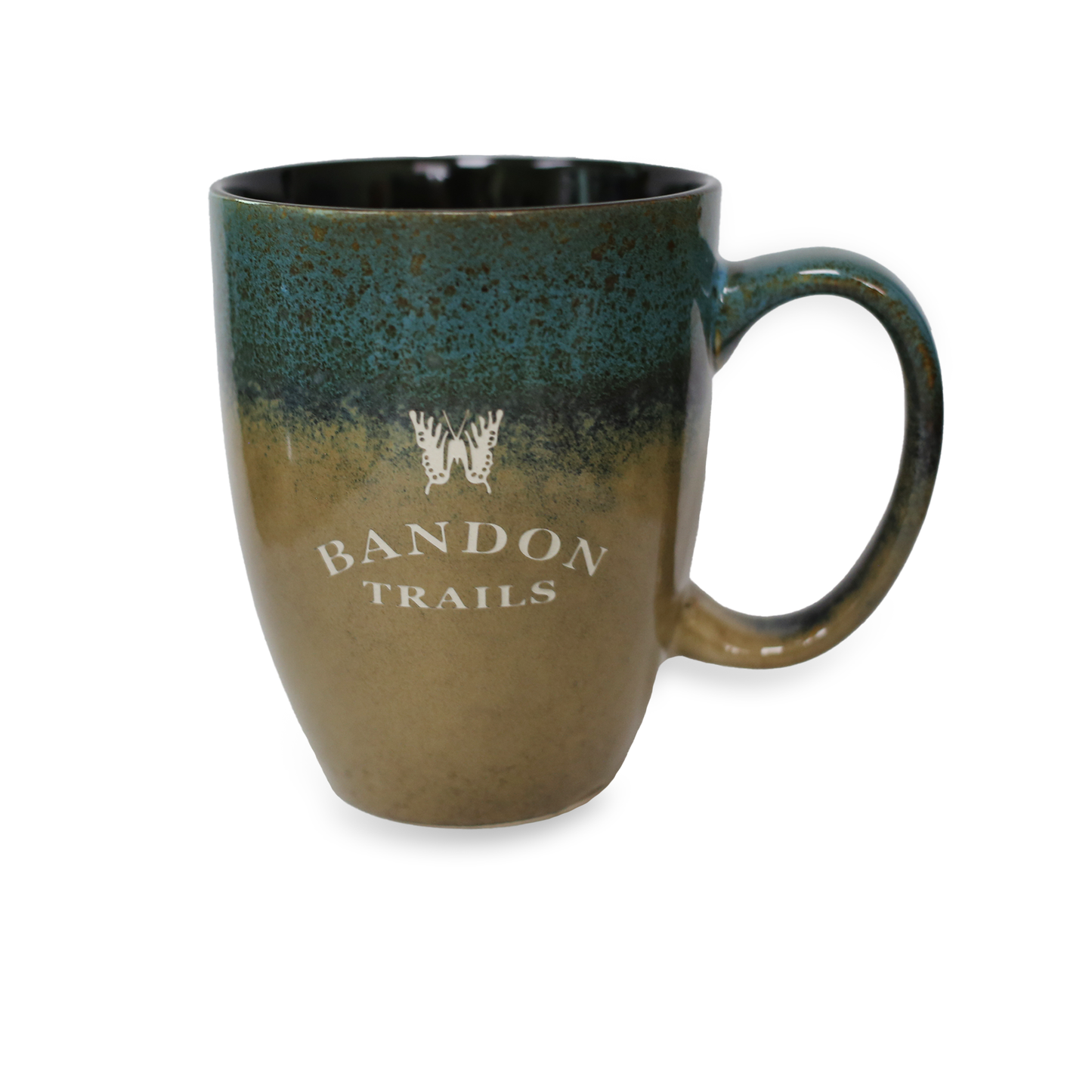 Ceramic mug earth-toned with Bandon Trails logo. 