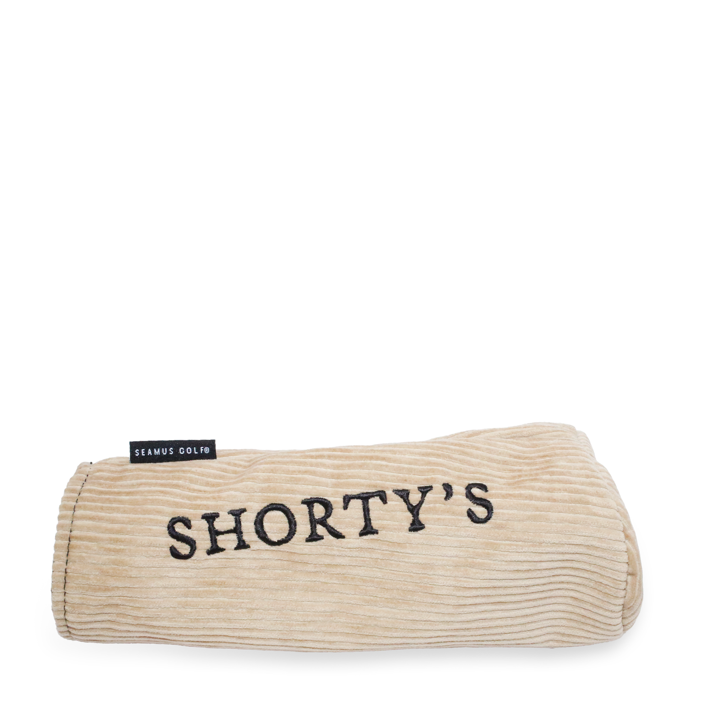 Side view of headcover made of a beige corduroy with a dark brown fleece lining. Featuring Shorty's script.