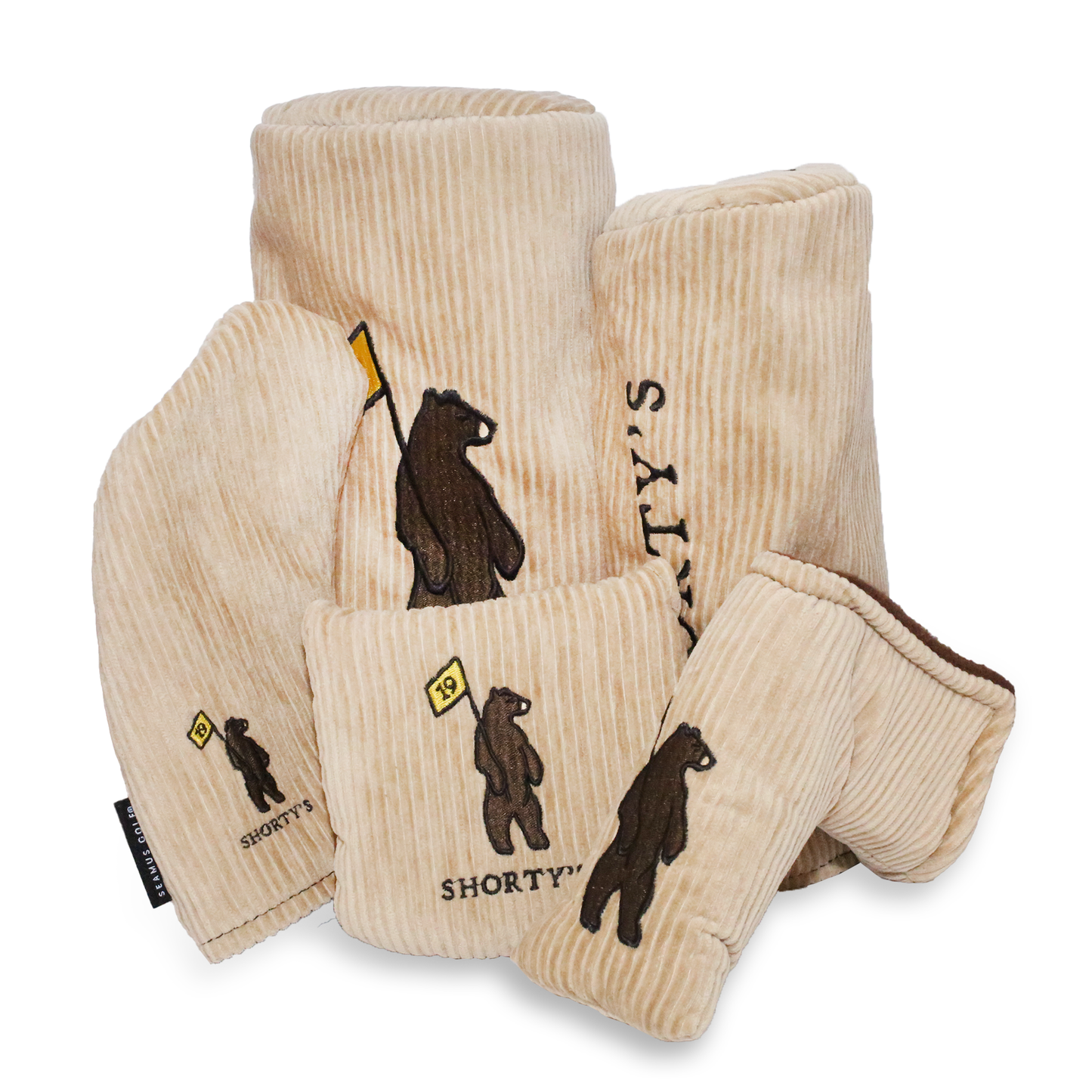 Set of headcovers made of a beige corduroy with a dark brown fleece lining. Featuring Shorty's bear logo