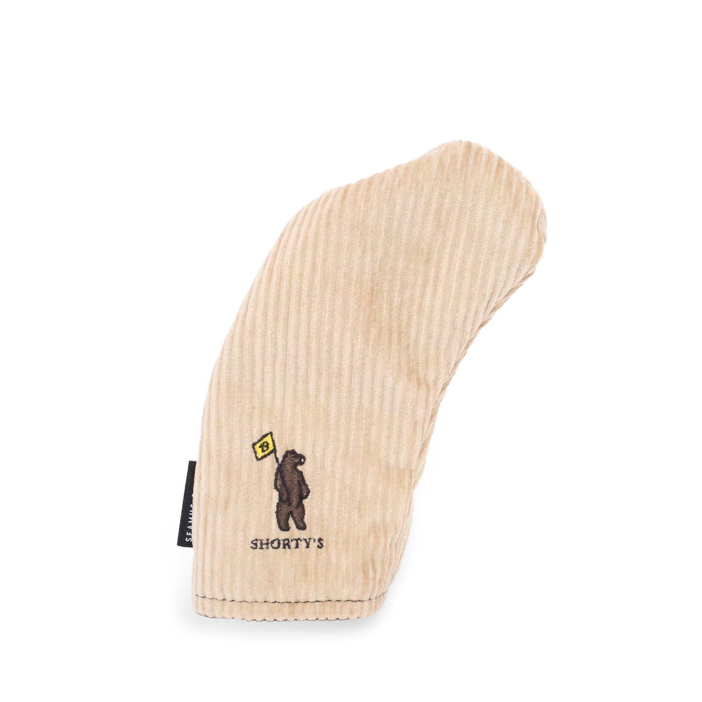 Hybrid headcover made of a beige corduroy with a dark brown fleece lining. Featuring Shorty's bear logo