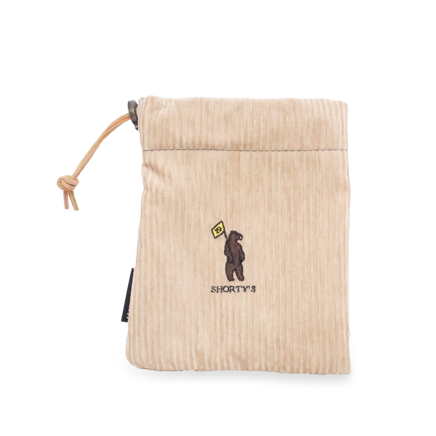 Drawstring pouch made of a beige corduroy with a dark brown fleece lining. Featuring Shorty's bear logo