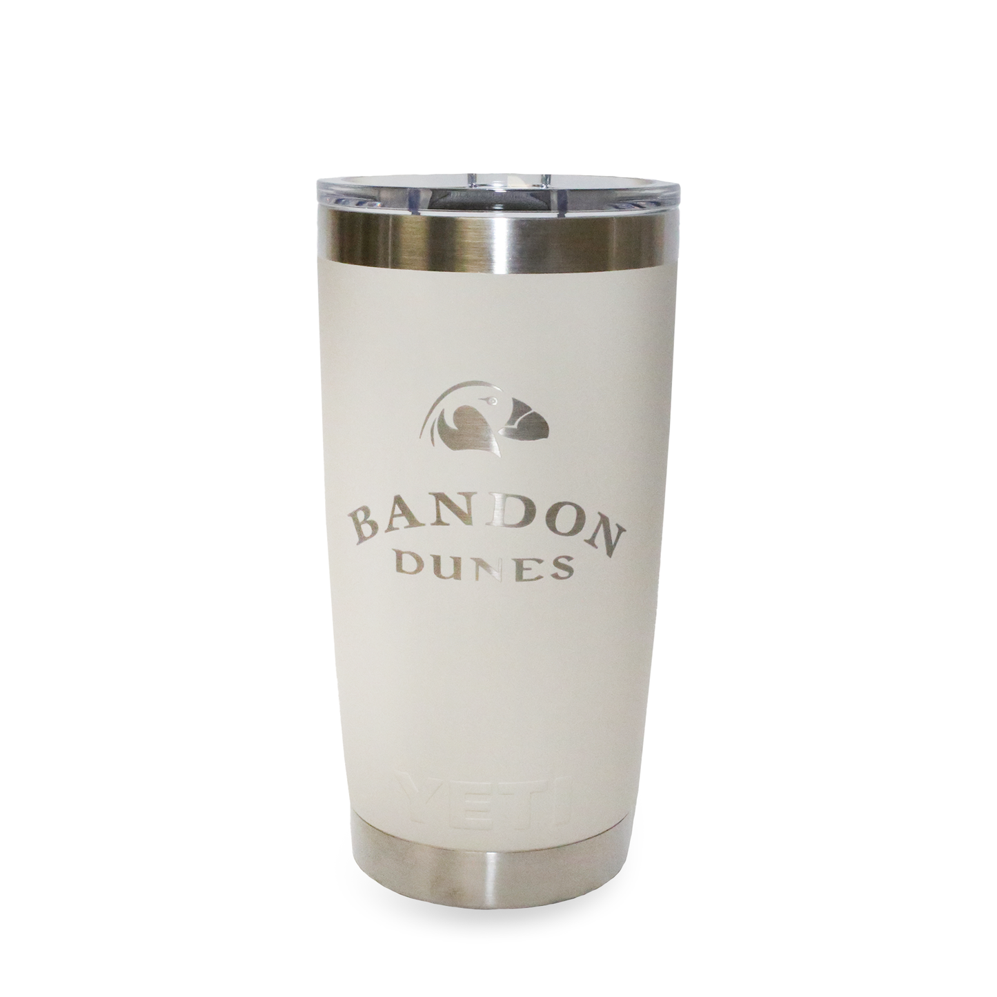 A taupe 20 ounce Yeti tumbler with the Bandon Dunes logo on the front.